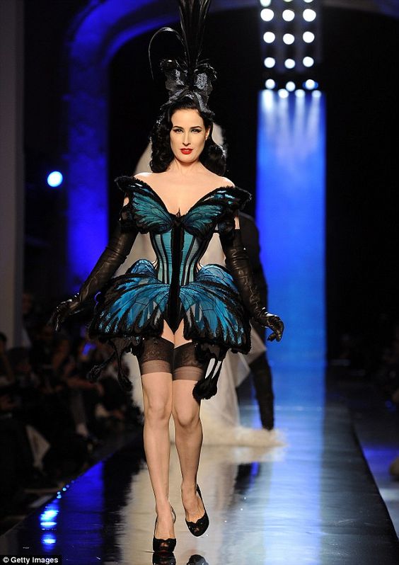 Madame Butterfly: The burlesque queen took to the runway in a magnificent corsetted costume based on the colourfully-winged insects