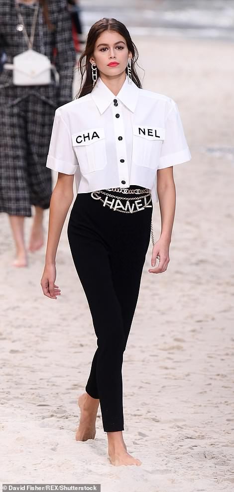 Kaia Gerber and Adwoa Aboah rock the sand covered Chanel runway