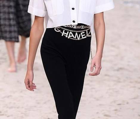 Kaia Gerber and Adwoa Aboah rock the sand covered Chanel runway