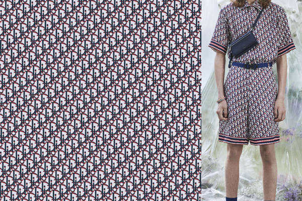 探索独特风格：红黑几何图案服装印花面料