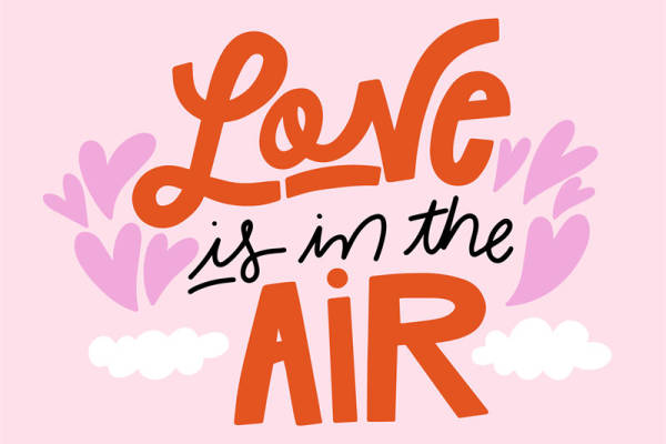 浪漫粉色背景上的爱在空气中裁片印花服装