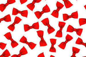 红色蝴蝶结重复图案面料印花素材，适用于儿童服装与节日主题服装印花设计