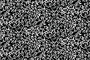 黑白字母乱序纹理面料印花素材，适用于潮流服装印花设计